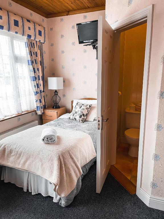 Postel nebo postele na pokoji v ubytování St Anthonys B&B