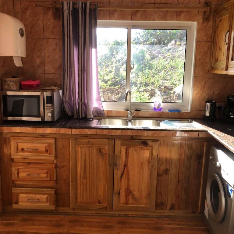 Kuchyň nebo kuchyňský kout v ubytování Mirella Villa Ocean View Villa