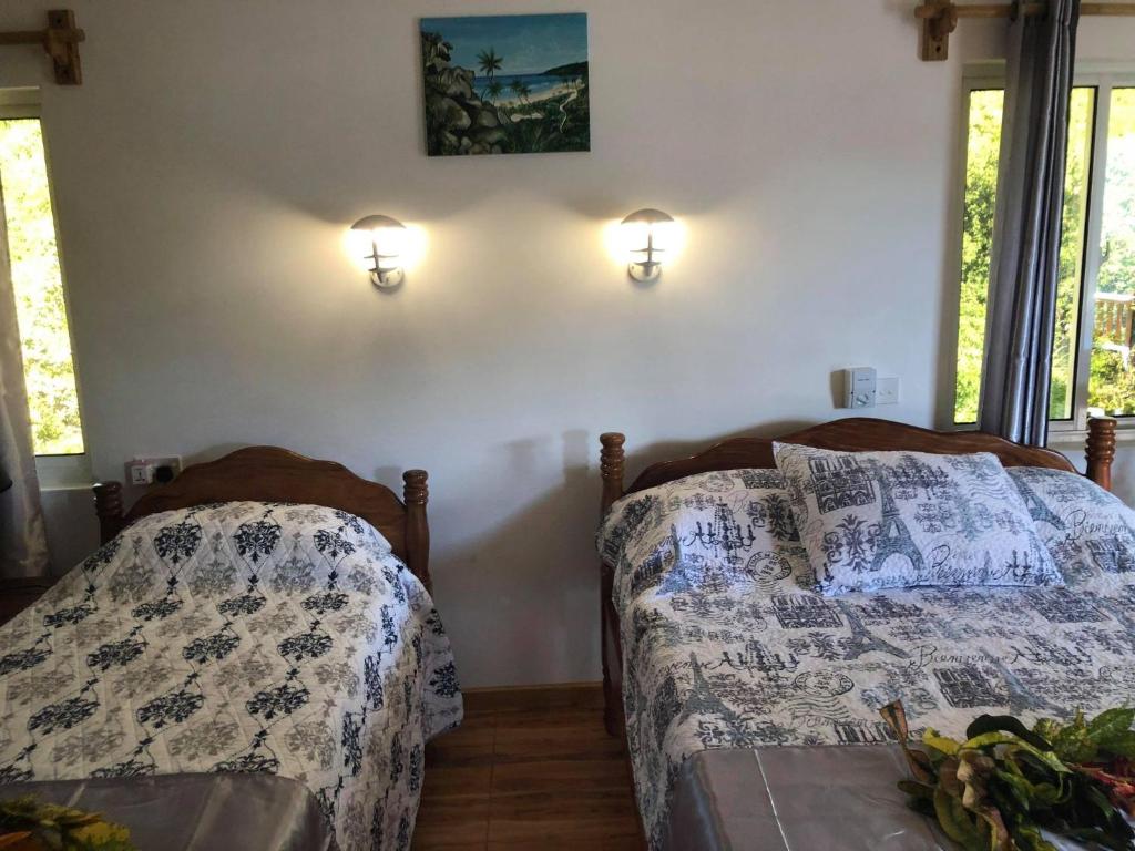 Postel nebo postele na pokoji v ubytování Mirella Villa Ocean View Villa