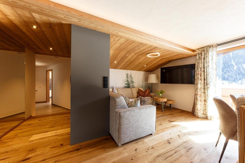 TV a/nebo společenská místnost v ubytování Fischerstraum am See Suite