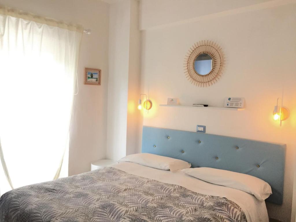 Postel nebo postele na pokoji v ubytování Zimmer Camere