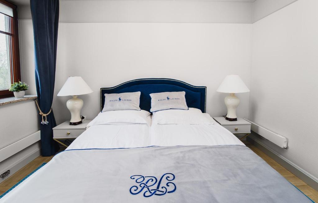 Posteľ alebo postele v izbe v ubytovaní Apartament ,,Cesarski Dwór”