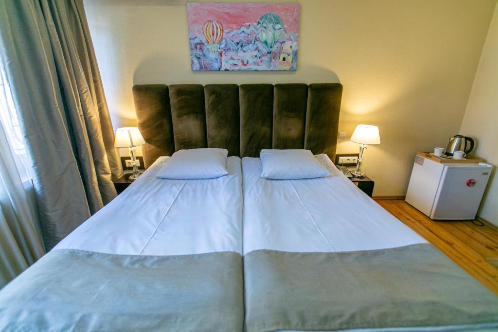 Postel nebo postele na pokoji v ubytování Hotel VIP