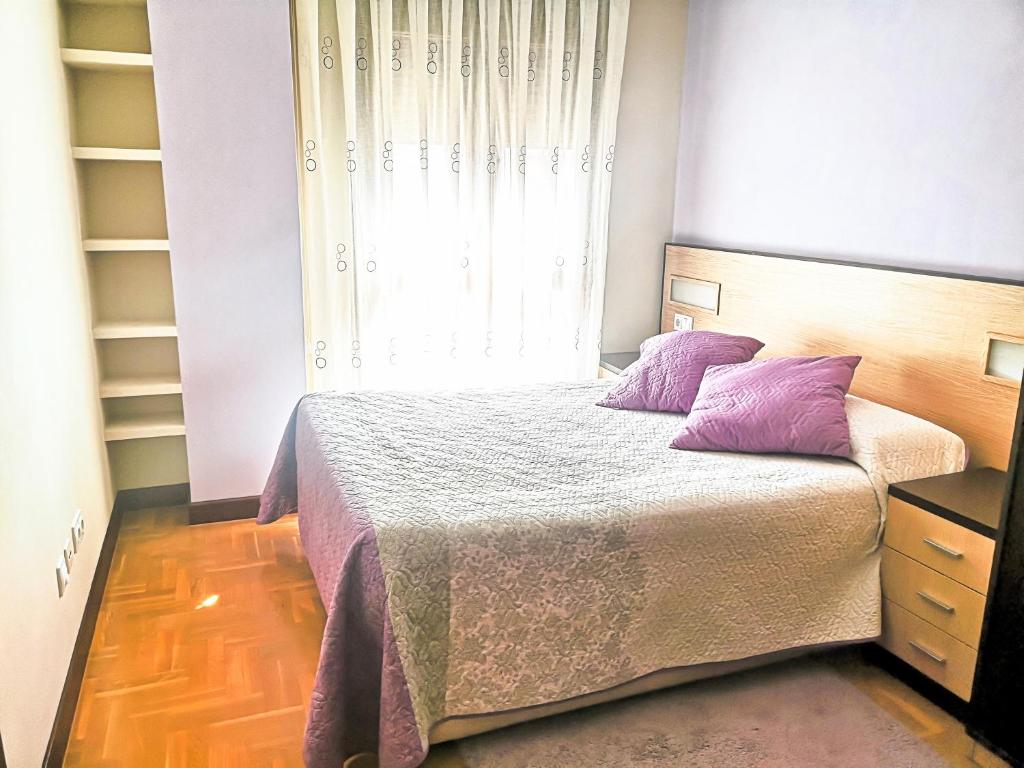 Postel nebo postele na pokoji v ubytování CORAZON DE LUANCO