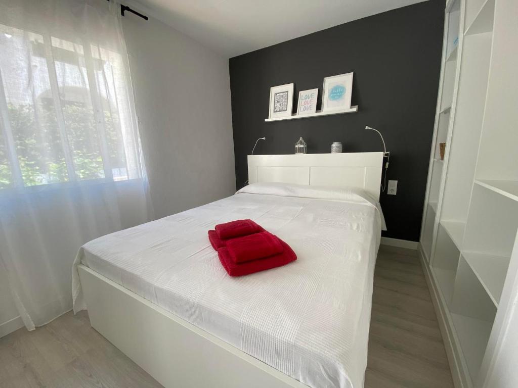 Postel nebo postele na pokoji v ubytování C-4 by SOM Menorca