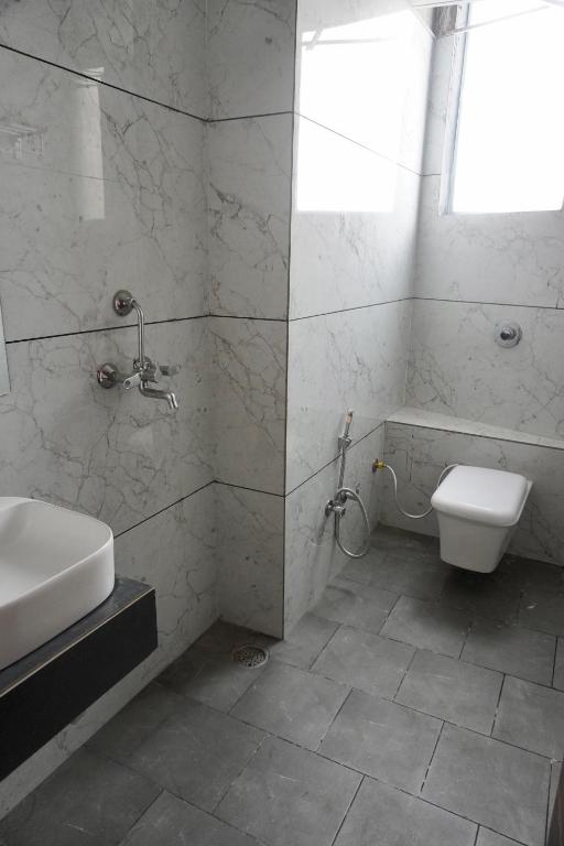 Koupelna v ubytování Era hotel