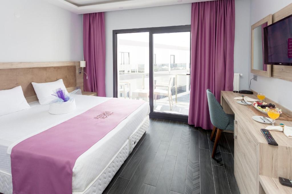 Postel nebo postele na pokoji v ubytování Sunsan Hotel