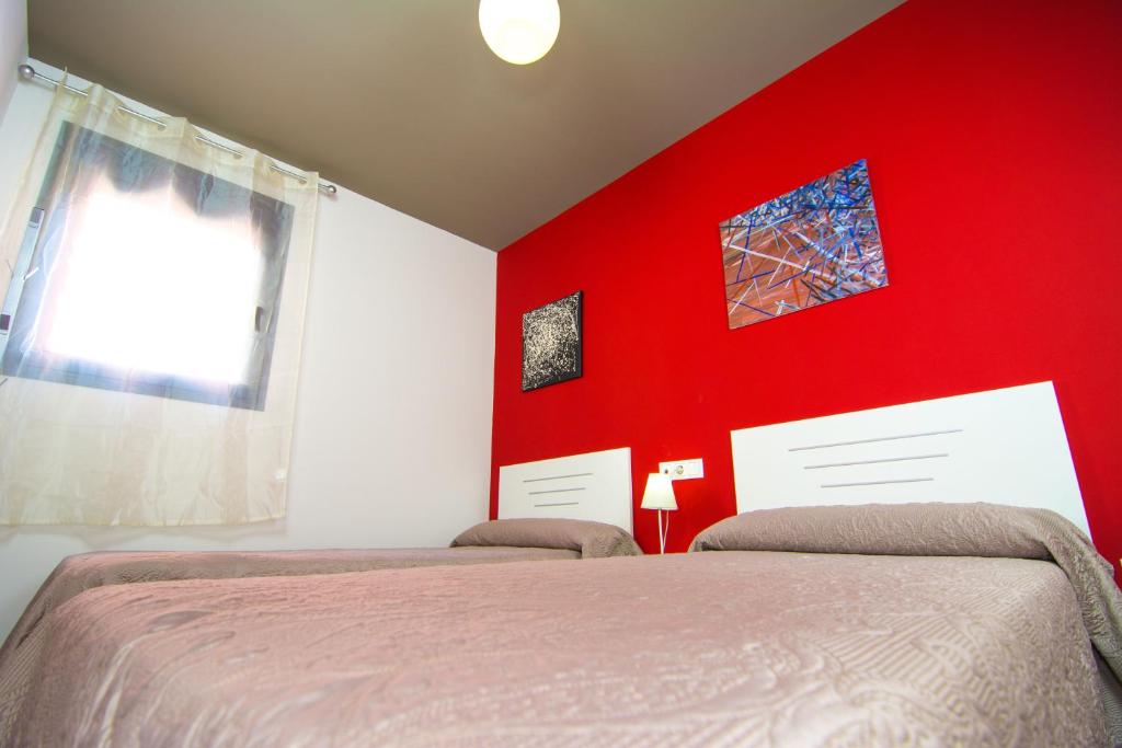 Posteľ alebo postele v izbe v ubytovaní Apartamentos 16:9 Playa Suites