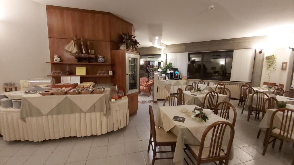 Restaurace v ubytování Albergo Al Cacciatore