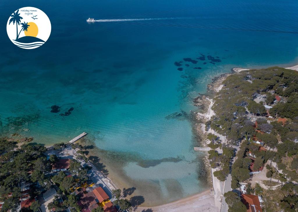 an aerial view of the ocean and a beach at Mobile Homes Crystal Camp Soline in Biograd na Moru