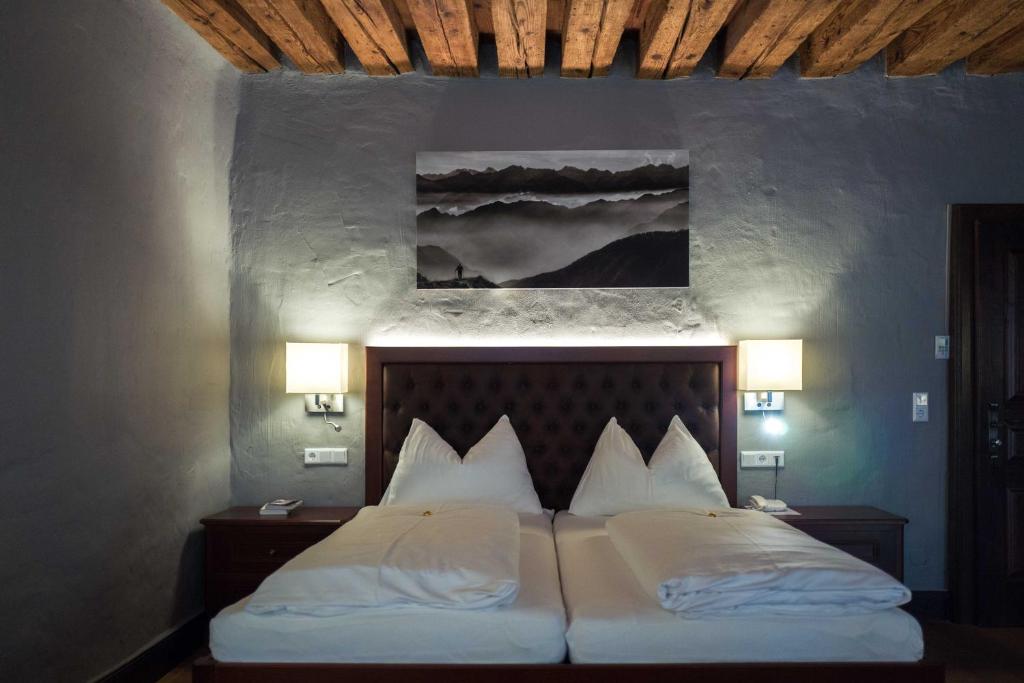 Postel nebo postele na pokoji v ubytování Altstadt Hotel Stadtkrug