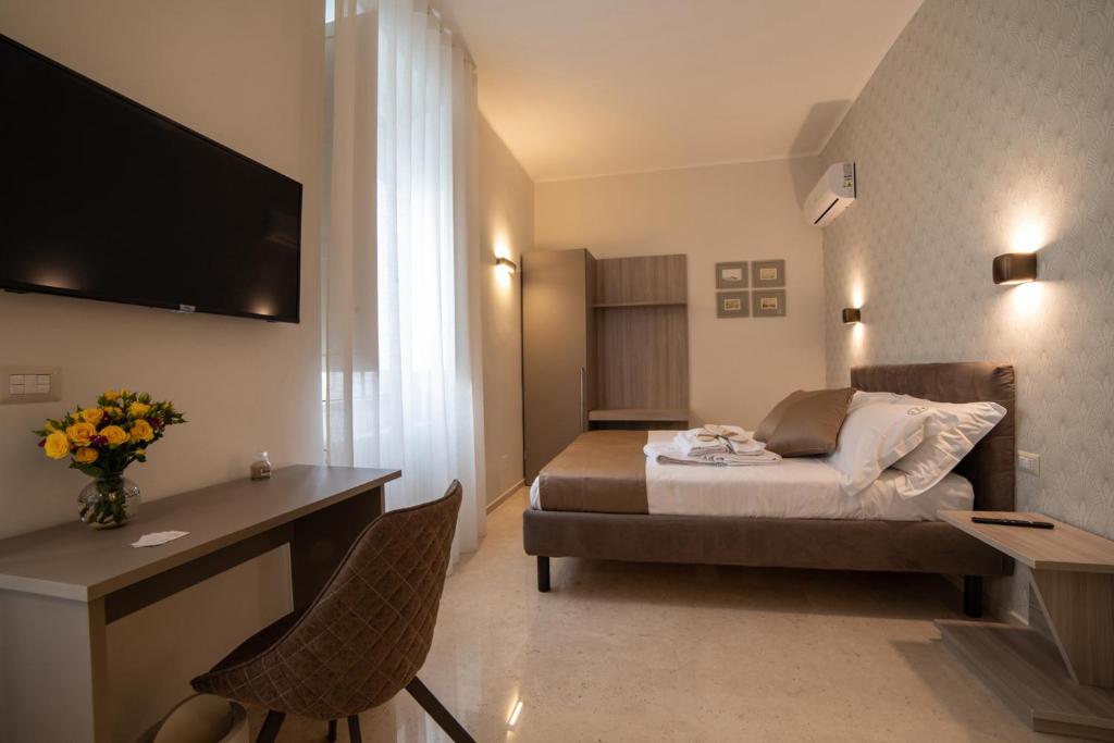 Postel nebo postele na pokoji v ubytování Bebio Rooms