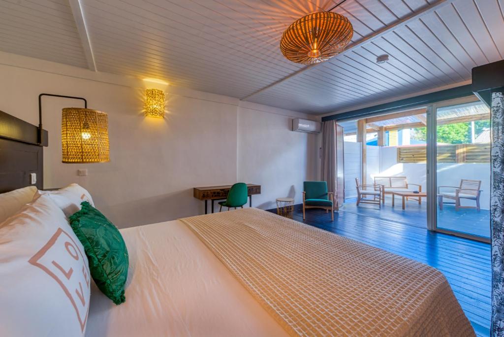 Postel nebo postele na pokoji v ubytování Love Boutique Hotel