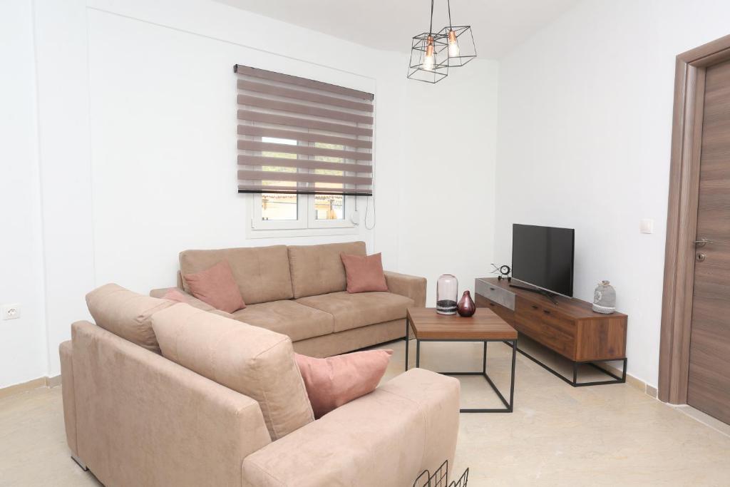 Televízia a/alebo spoločenská miestnosť v ubytovaní Mare Monte Luxury Apartments 2