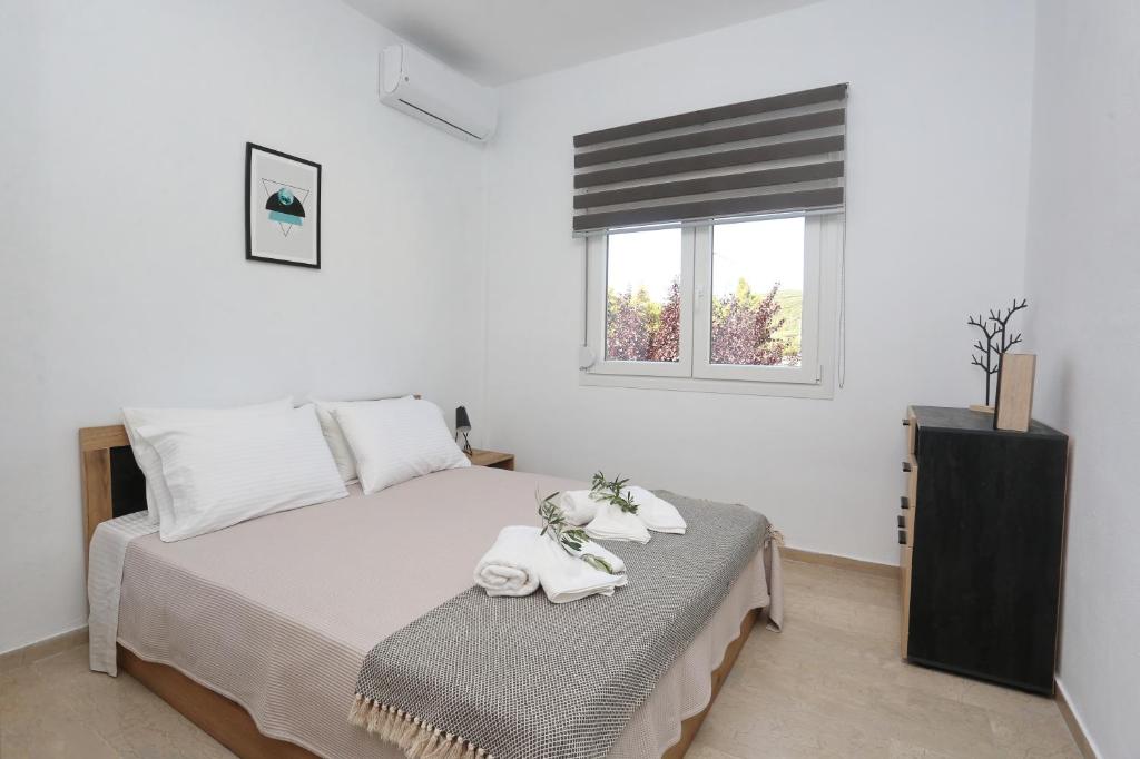 Posteľ alebo postele v izbe v ubytovaní Mare Monte Luxury Apartments 2