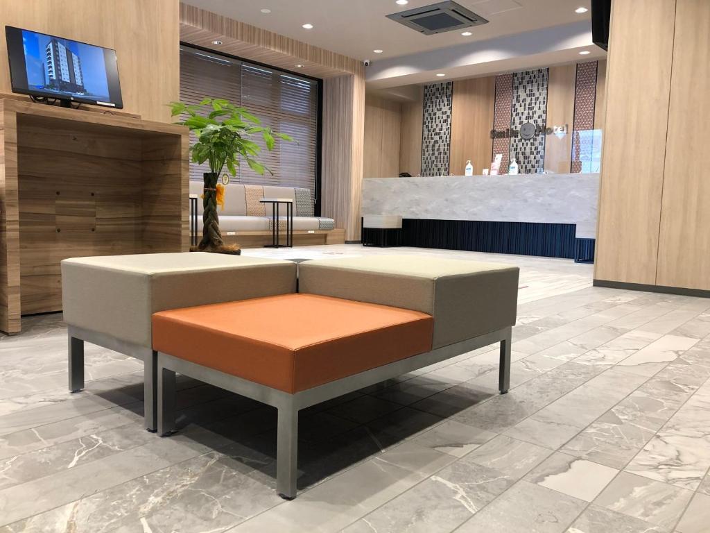 TV a/nebo společenská místnost v ubytování Smile Hotel Osaka Nakanoshima