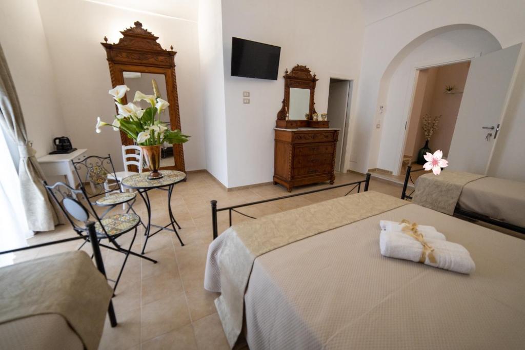 Postel nebo postele na pokoji v ubytování B&B Palazzo Loreto