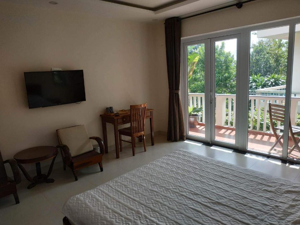 Voodi või voodid majutusasutuse Nguyen Duy homestay toas