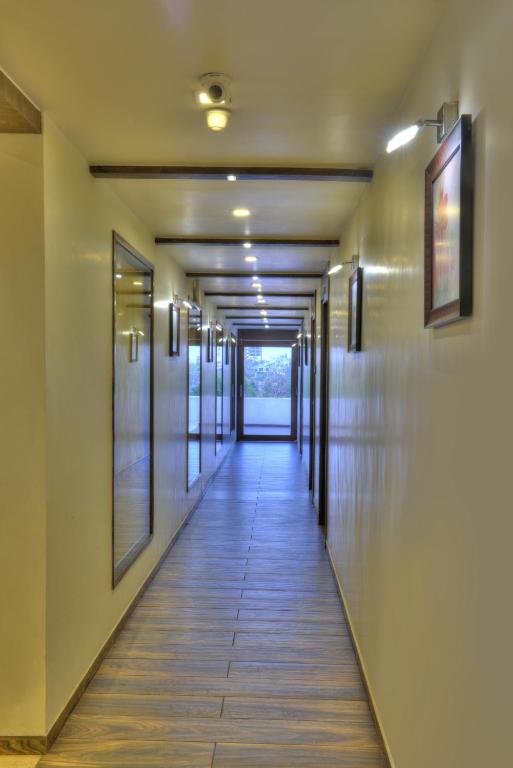 Fotografie z fotogalerie ubytování Hotel Aaram Orchard v destinaci Ahmadábád