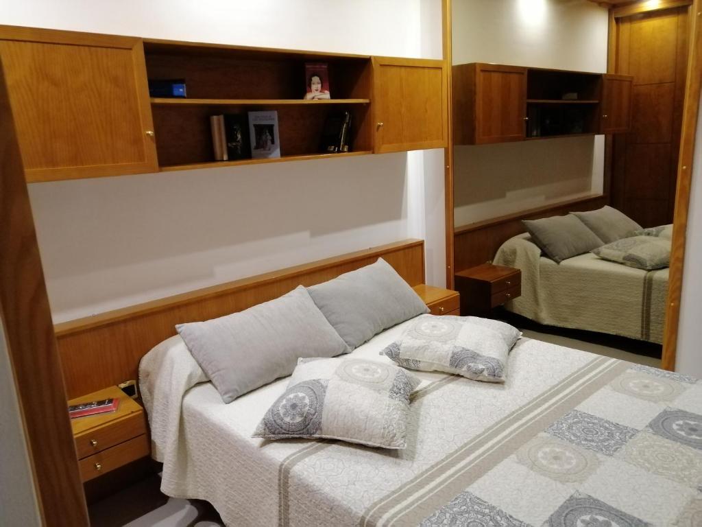 Ένα ή περισσότερα κρεβάτια σε δωμάτιο στο Casa Amaia