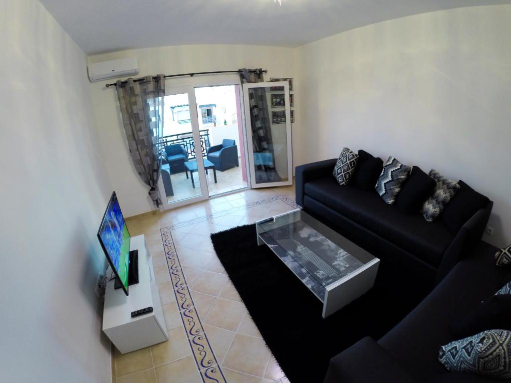 TV a/nebo společenská místnost v ubytování Appartement Résidence Alwaha Saidia