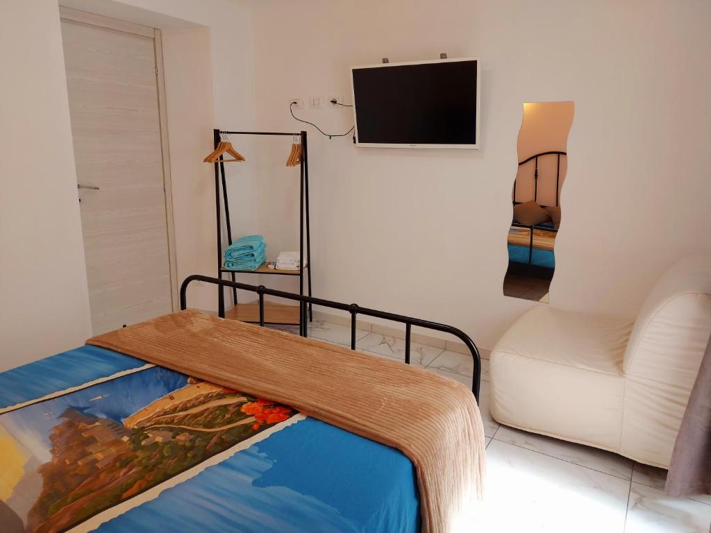 Postel nebo postele na pokoji v ubytování Camera matrimoniale Genova rooms