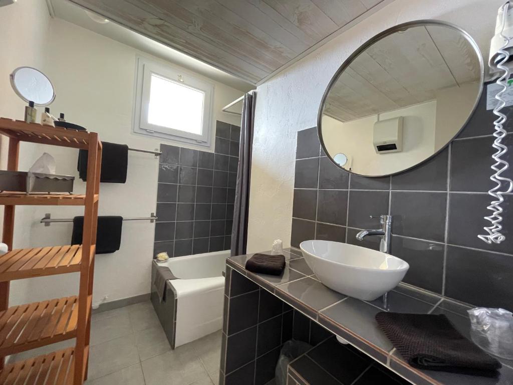 Koupelna v ubytování Hotel L'Orangeraie