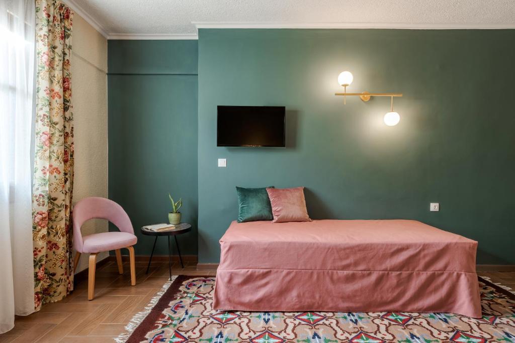 Postel nebo postele na pokoji v ubytování Paeonia Arachova