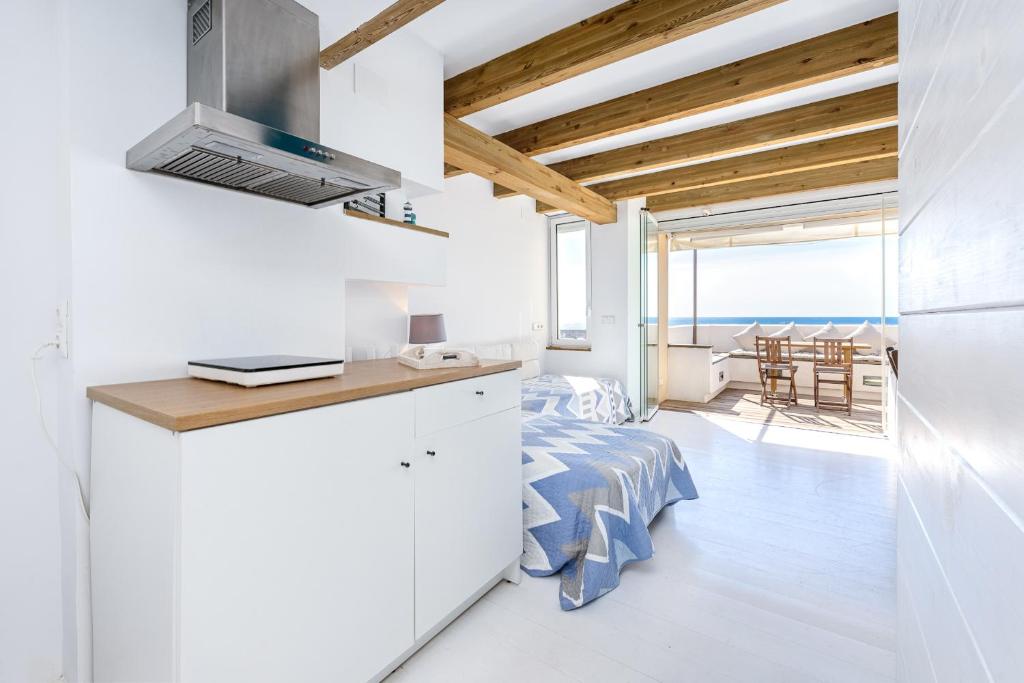 Posteľ alebo postele v izbe v ubytovaní Hauzify I Loft Brisa del Mar