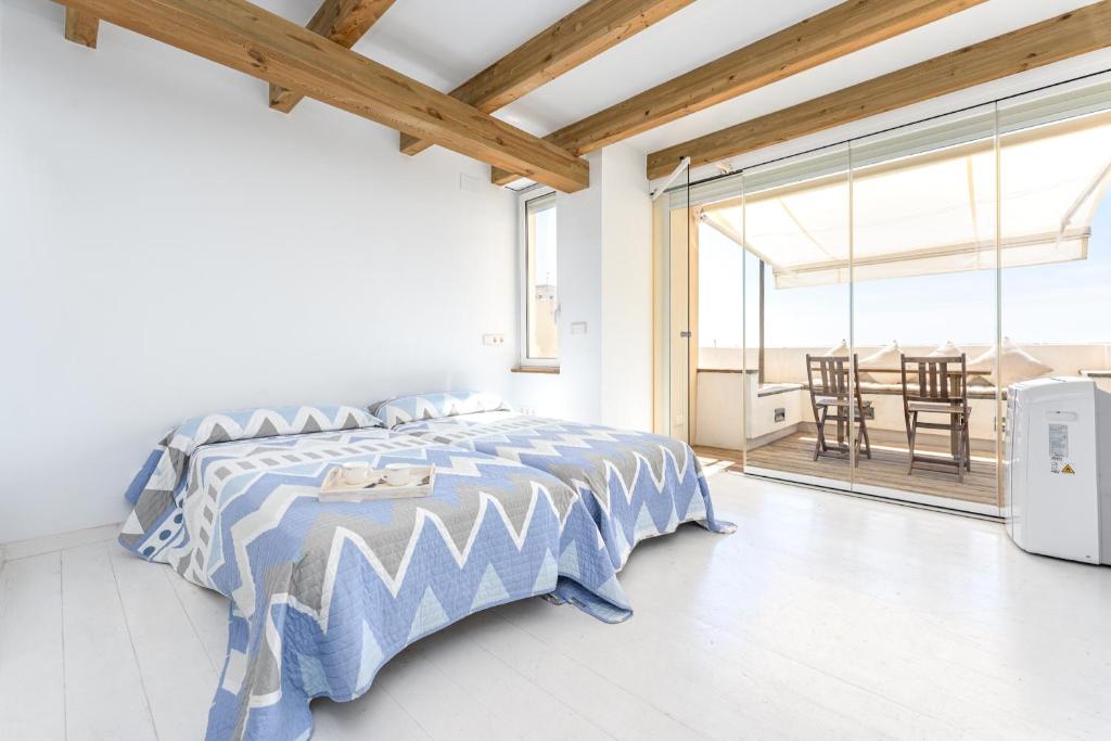 Posteľ alebo postele v izbe v ubytovaní Hauzify I Loft Brisa del Mar