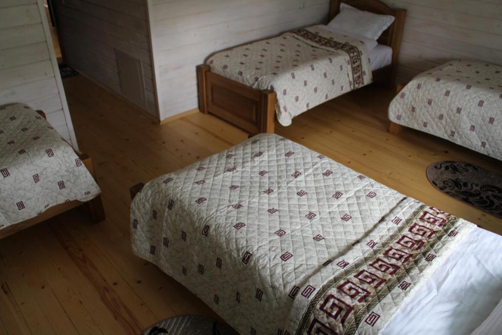 Postel nebo postele na pokoji v ubytování Kolochava Hotel & Restaurant