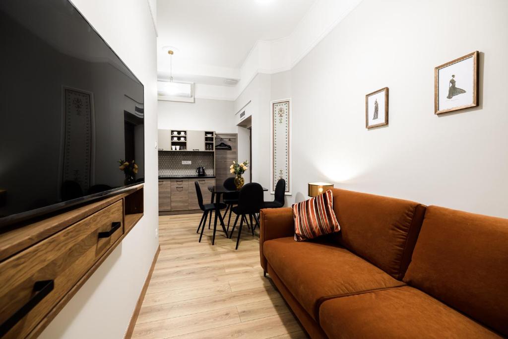 Televízia a/alebo spoločenská miestnosť v ubytovaní Apart Residence Ariańska 16 by NEARTO PL