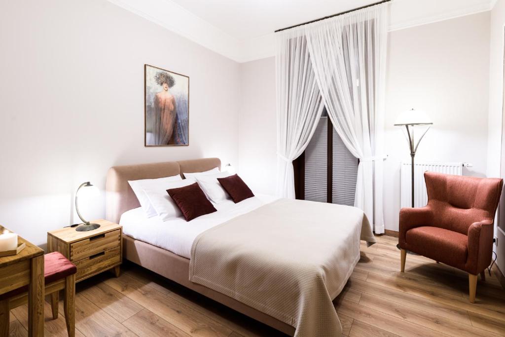Posteľ alebo postele v izbe v ubytovaní Apart Residence Ariańska 16 by NEARTO PL