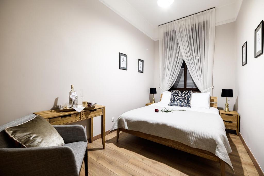 Posteľ alebo postele v izbe v ubytovaní Apart Residence Ariańska 16 by NEARTO PL