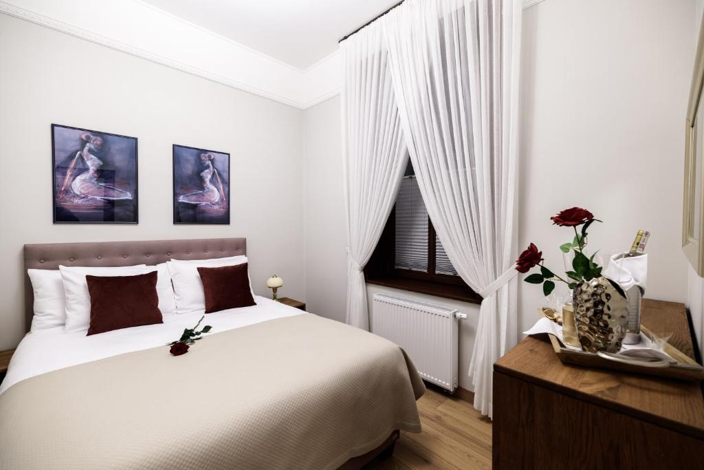 Posteľ alebo postele v izbe v ubytovaní Apart Residence Ariańska 16 by NEARTO PL