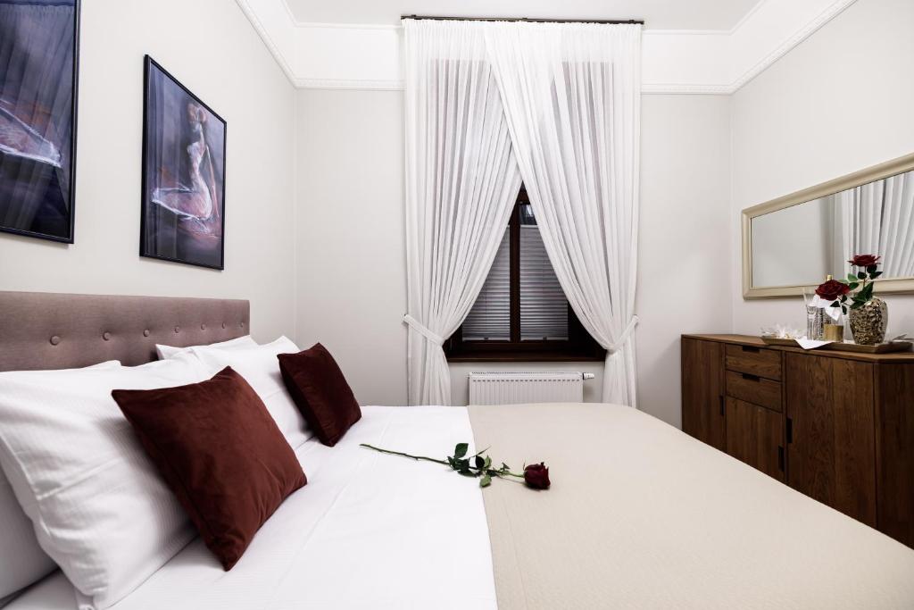 Posteľ alebo postele v izbe v ubytovaní Apart Residence Ariańska 16 by NEARTO PL