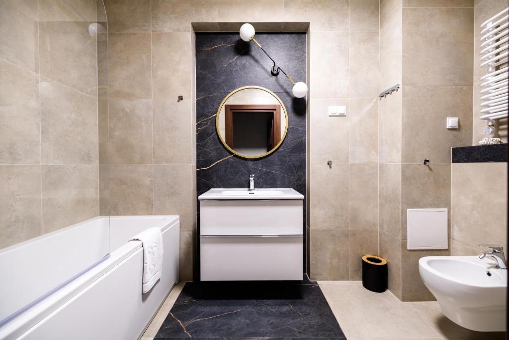 Kúpeľňa v ubytovaní Apart Residence Ariańska 16 by NEARTO PL