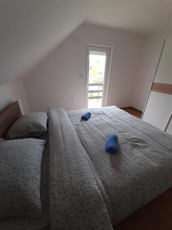 Postel nebo postele na pokoji v ubytování Apartman Djokovic