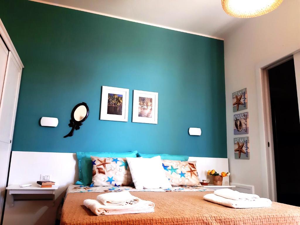 Łóżko lub łóżka w pokoju w obiekcie La Villa di Eracle
