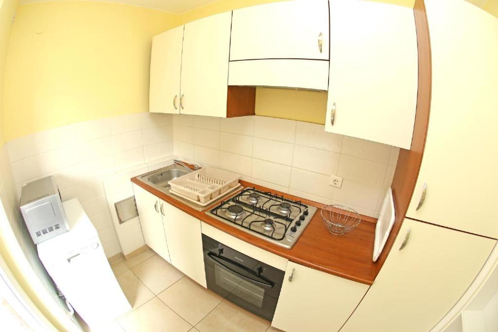 Kuchnia lub aneks kuchenny w obiekcie Apartments SOLARIS - with PRIVATE PARKING