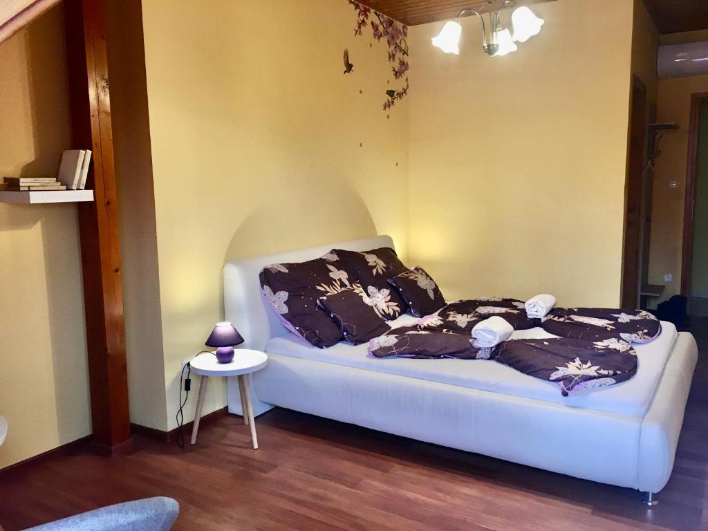 Postel nebo postele na pokoji v ubytování Marta Guest House