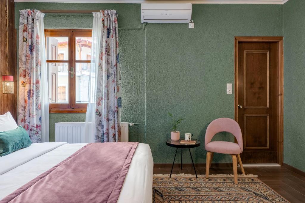 Postel nebo postele na pokoji v ubytování Paeonia Arachova