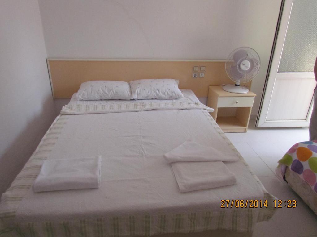 Postel nebo postele na pokoji v ubytování Makri Otel