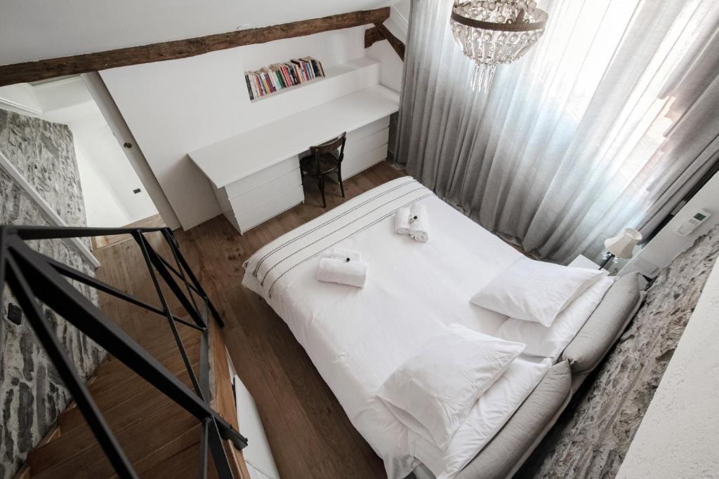 Posteľ alebo postele v izbe v ubytovaní House Of Dreams