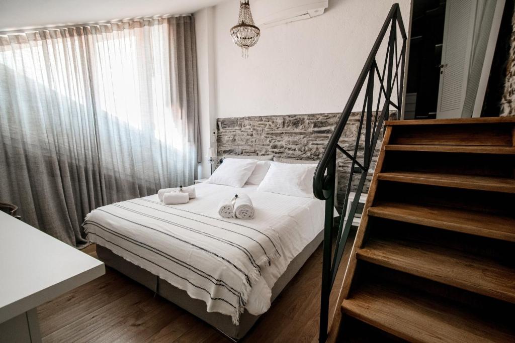 Posteľ alebo postele v izbe v ubytovaní House Of Dreams
