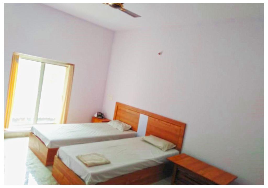 Postel nebo postele na pokoji v ubytování AYM Yoga Resort Arambol GOA