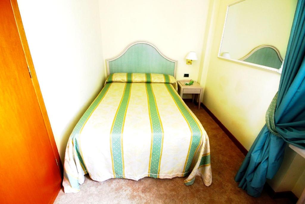 Postel nebo postele na pokoji v ubytování Hotel Siesta