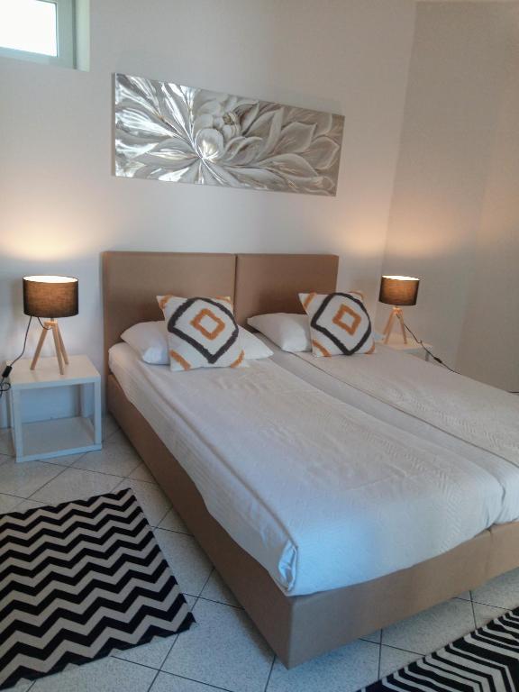 Postel nebo postele na pokoji v ubytování Accommodation Zara