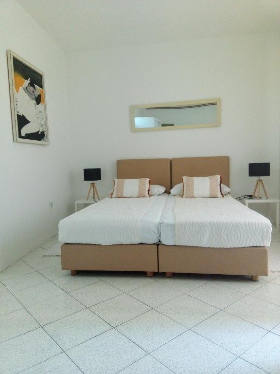 Postel nebo postele na pokoji v ubytování Accommodation Zara