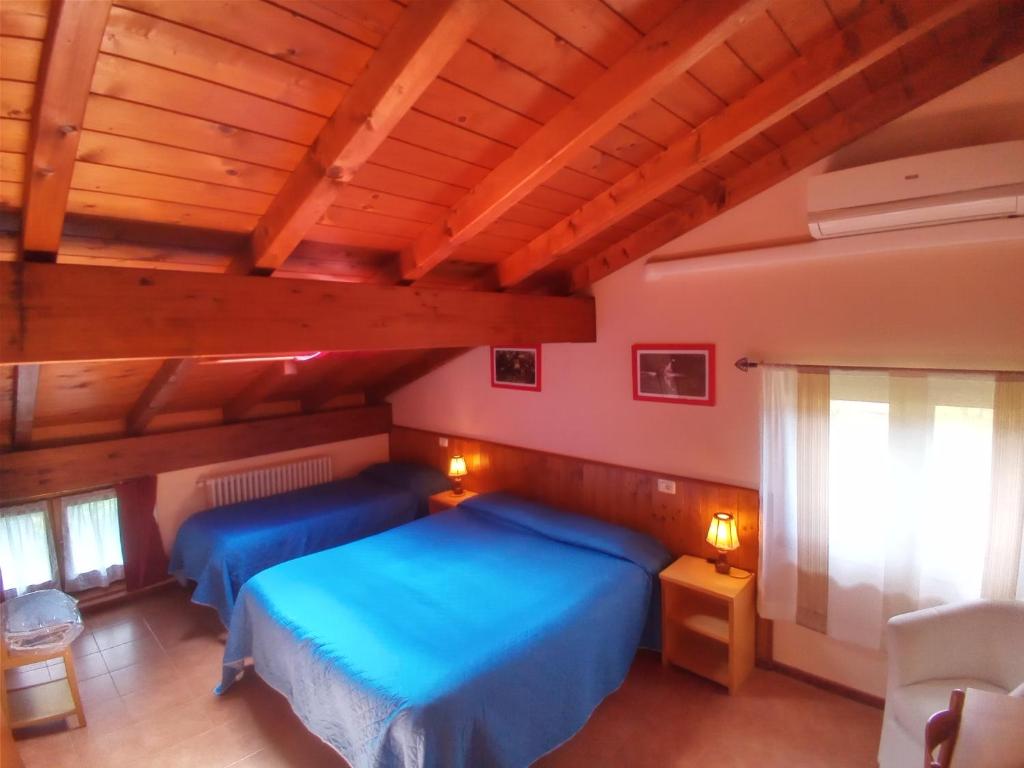 Posteľ alebo postele v izbe v ubytovaní Guest House Il Nido dello Svasso -Foresteria Lombarda-